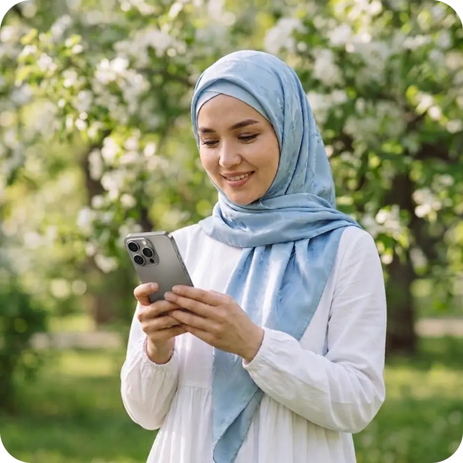 Woman using mobile phone outdoors